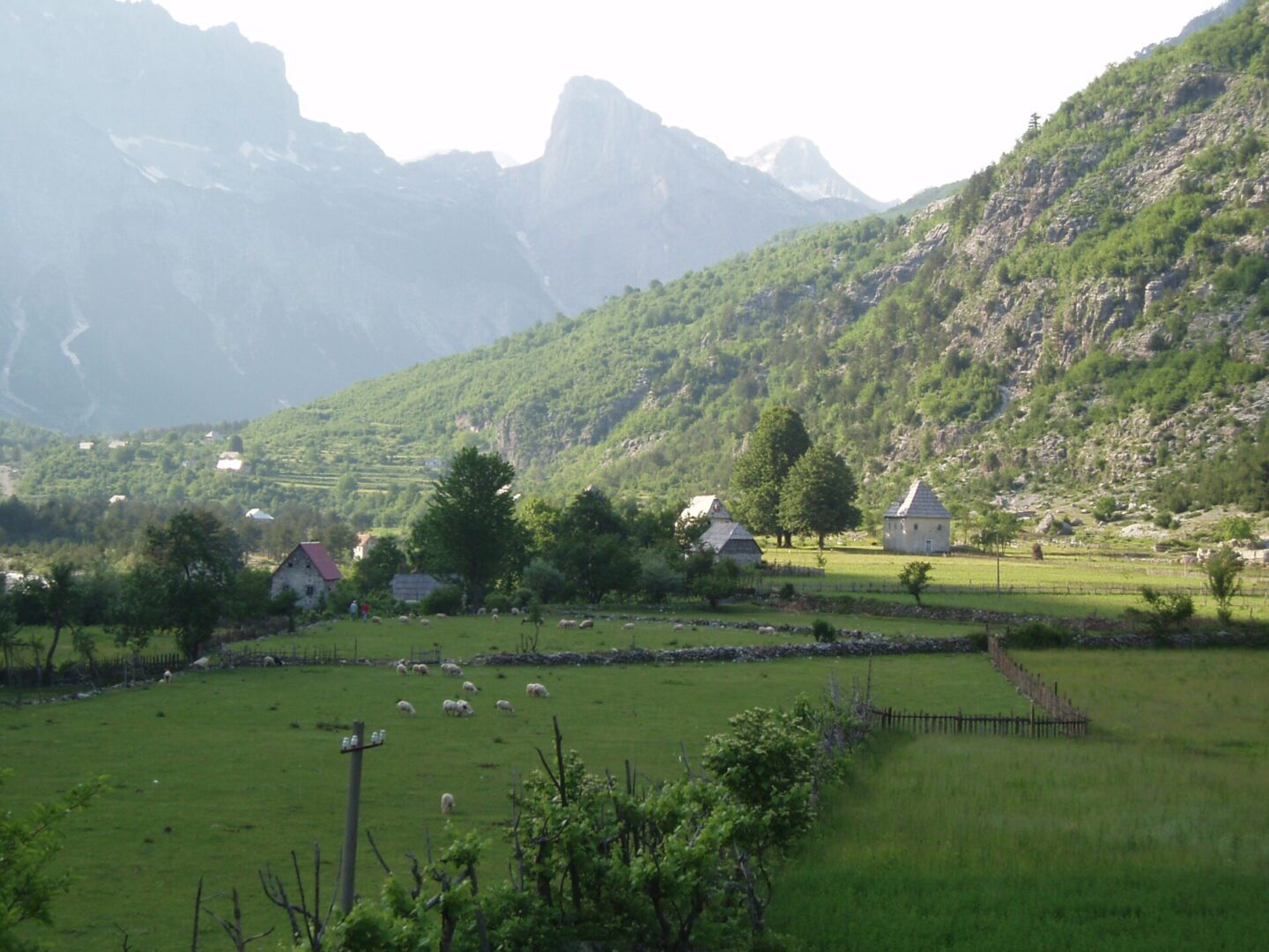 Houses nestled in mountainous landscape