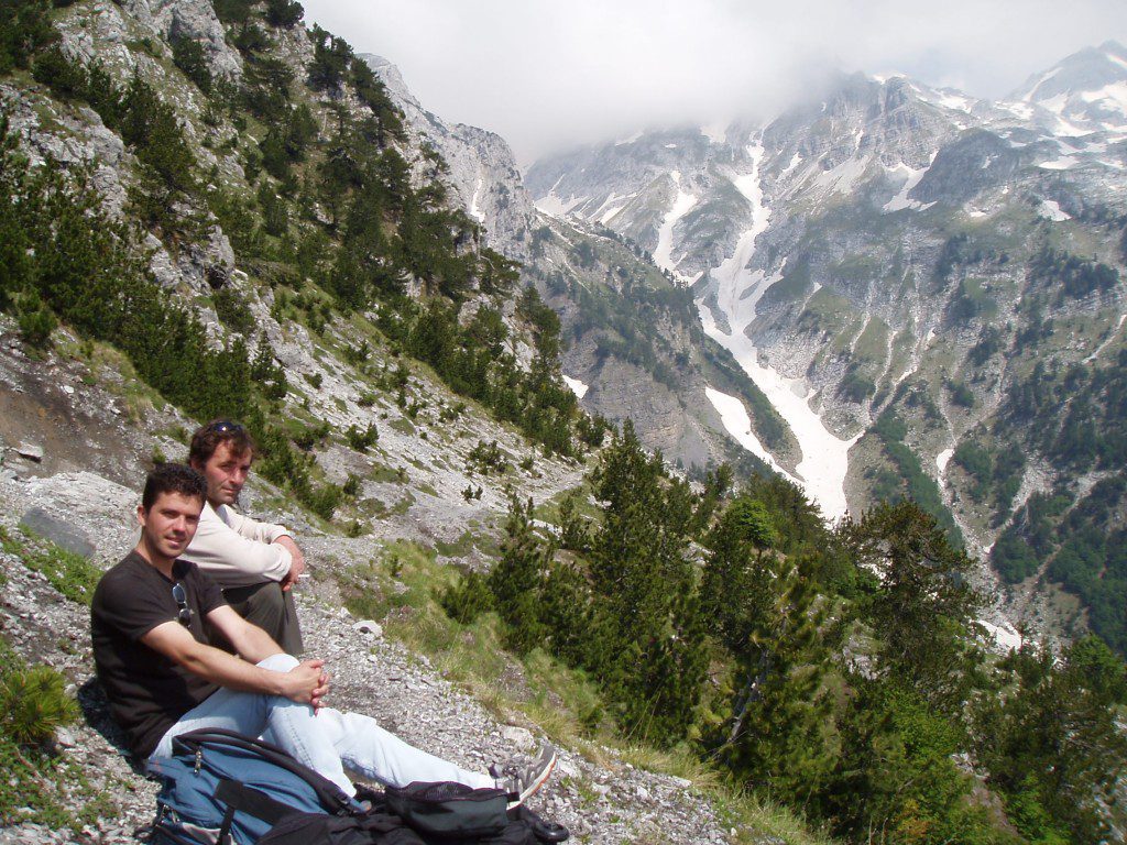 Scenic mountain view with two hikers