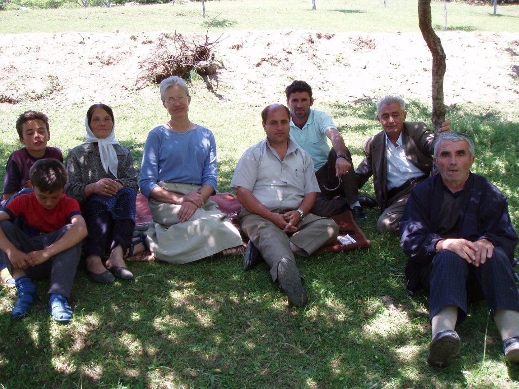 People relaxing on grass outdoors