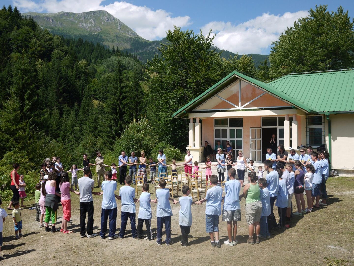 Outdoor group activity near forest lodge